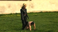 New slave trained by his dominatrix outside