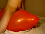 Big inflatable orange balloon humping cum