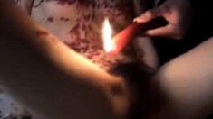 She's covered in candle wax as he tortures her before he fucks her
