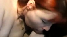 Redhead with huge boobies moaning in doggy position